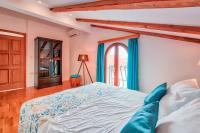 Posteľ alebo postele v izbe v ubytovaní Pool Villa Abbazia Seaview - Happy Rentals