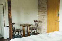 Masukichi -hostel,cafe,souvenir,guide-にあるベッド
