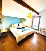 Postel nebo postele na pokoji v ubytování Casa Baia Hendaye