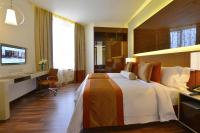 Fraser Suites Diplomatic Area Bahrainにあるベッド