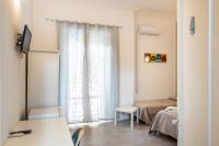 A bed or beds in a room at B&b Glamour