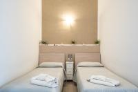 A bed or beds in a room at B&b Glamour
