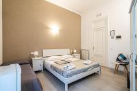 A bed or beds in a room at B&b Glamour