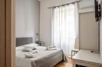 A bed or beds in a room at B&b Glamour