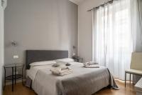 A bed or beds in a room at B&b Glamour