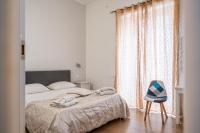 A bed or beds in a room at B&b Glamour