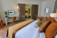 Fraser Suites Diplomatic Area Bahrainにあるベッド