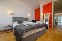 Postel nebo postele na pokoji v ubytování Luxury apartment Eni on the West Coast