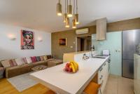 Kuchyň nebo kuchyňský kout v ubytování Luxury apartment Eni on the West Coast