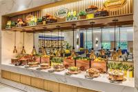 a display case in a store with fruits and vegetables at voco Chiayi by IHG in Chiayi City