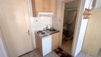Kuchyň nebo kuchyňský kout v ubytování Angelos Rooms
