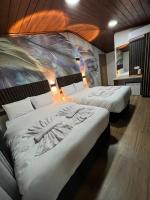 Postel nebo postele na pokoji v ubytování Bonita Hotel