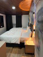 Postel nebo postele na pokoji v ubytování Bonita Hotel