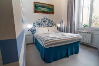 Posteľ alebo postele v izbe v ubytovaní Teresa Rooms & Suites