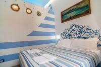 Posteľ alebo postele v izbe v ubytovaní Teresa Rooms & Suites