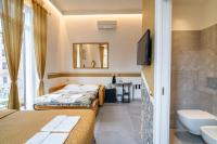Posteľ alebo postele v izbe v ubytovaní Teresa Rooms & Suites