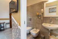 Kúpeľňa v ubytovaní Teresa Rooms & Suites