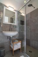 Kúpeľňa v ubytovaní Teresa Rooms & Suites