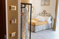 Posteľ alebo postele v izbe v ubytovaní Teresa Rooms & Suites