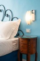 Posteľ alebo postele v izbe v ubytovaní Teresa Rooms & Suites