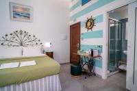 Posteľ alebo postele v izbe v ubytovaní Teresa Rooms & Suites