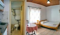Postel nebo postele na pokoji v ubytování Angelos Rooms