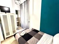 Posteľ alebo postele v izbe v ubytovaní JEF Apartments Vaticano, Roma