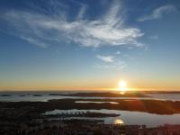 Blick auf den Sonnenuntergang über einer Stadt in der Unterkunft Basic Mansion Mandalina in Šibenik