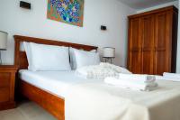 Postel nebo postele na pokoji v ubytování Port Balchik apartment