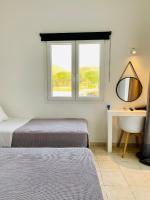 Alkyon Hotelにあるベッド