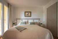 Cama o camas de una habitaci&oacute;n en Suite junior prestige en Provence sur le golf sign&eacute; Ballesteros