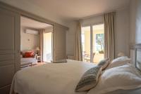 Cama o camas de una habitaci&oacute;n en Suite junior prestige en Provence sur le golf sign&eacute; Ballesteros