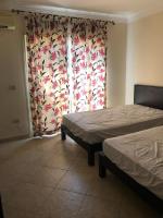 Postel nebo postele na pokoji v ubytování La Vista 1, Ain Soukhna Family Chalets