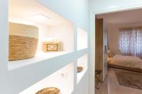 A bed or beds in a room at Montellino's Suite Oro