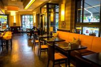 a dining room with tables and chairs in a restaurant at Hotel Hohenstaufen in Koblenz