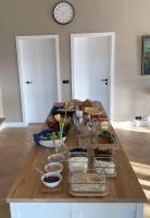 a table with food on it in a room at Hotel Stafholt in Varmaland