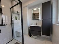 Kúpeľňa v ubytovaní Apartments Mohar II