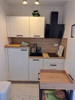 Kuchyňa alebo kuchynka v ubytovaní Apartments Mohar II
