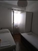 Posteľ alebo postele v izbe v ubytovaní Apartments Lorio