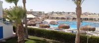 Bazén v ubytování Mirage hotel nebo v jeho okolí