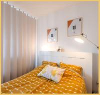 Postel nebo postele na pokoji v ubytov&aacute;n&iacute; Chez Berangere - T1 - St Julien