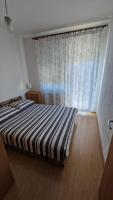 Posteľ alebo postele v izbe v ubytovaní APARTMAN J&M