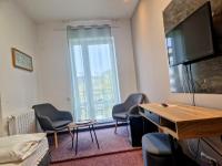 Telewizja i/lub zestaw kina domowego w obiekcie Family hotel Maxim