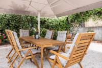 A patio or other outdoor area at ''Meraviglia casa'' Irida apartment