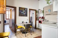 A kitchen or kitchenette at URBANA 37 Maison