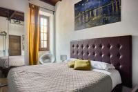 A bed or beds in a room at URBANA 37 Maison