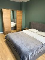 Postel nebo postele na pokoji v ubytování Urban Edge by RV Apartments