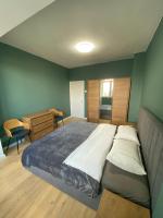 Postel nebo postele na pokoji v ubytování Urban Edge by RV Apartments