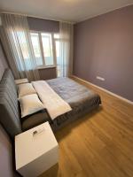 Postel nebo postele na pokoji v ubytování Urban Edge by RV Apartments