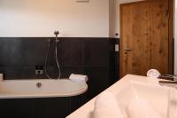 A bathroom at Apartment in Bramberg am Wildkogel with barbecue